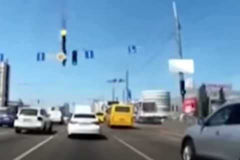 Dashcam captures Russian missile section falling in traffic on Kyiv road
