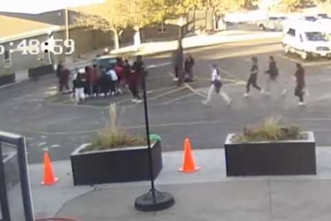 Watch as students lift a car off a mother and child pinned beneath it