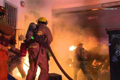 Early video: Trash fire extends to Los Angeles building